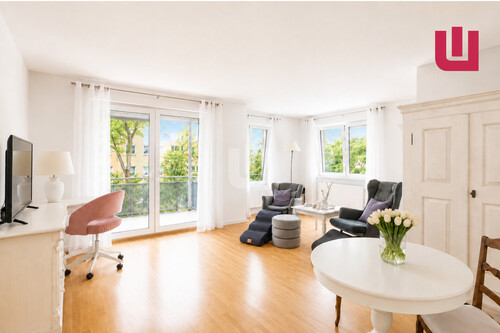 Wohnzimmer - WINDISCH - Moderne und barrierearme 3-Zimmer-Wohnung mit zwei Balkonen - Frei ab 01.10.26