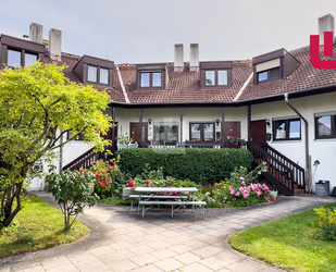 WINDISCH IMMOBILIEN - Gemütliche 4-Zi. Maisonette-Wohnung zentral in Gröbenzell am Gröbenbach