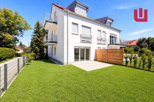 Gartenansicht - WINDISCH - ERSTBEZUG! Traumhafte Gartenwohnung mit EBK zentral in Gröbenzell - frei ab August