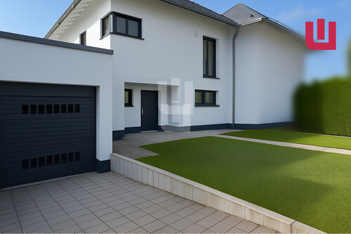 Hausansicht - WINDISCH IMMOBILIEN - Neuwertige Doppelhaushälfte in zentraler Lage befristet zu vermieten!