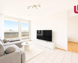 WINDISCH IMMOBILIEN - Vermietete 2-Zimmerwohnung im 12. OG im Olympiadorf - München
