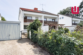 Außenansicht - WINDISCH IMMOBILIEN - Sanierungsbedürftige DHH mit viel Potential in verkehrsberuhigter Straße