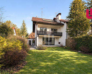 WINDISCH IMMOBILIEN - Große DHH mit eingewachsenem Garten und Einliegerwohnung in Gröbenzell-Nord