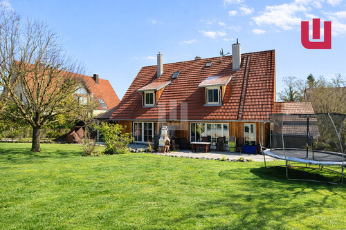 Gartenansicht - WINDISCH IMMOBILIEN - Schöne, ruhig gelegene DHH mit großem Garten in Puch