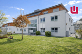 Außenansicht - WINDISCH - Moderne 2-Zi.- Gartenwohnung mit EBK und TG-Stellplatz zentral in Dachau - bezugsfrei!