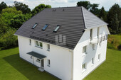 Außenansicht - WINDISCH IMMOBILIEN - Hochwertige DG - Wohnung zentral in Germerswang - frei ab 01.01.2026