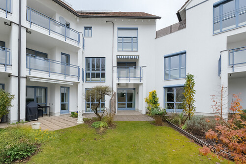 Hausansicht - WINDISCH IMMOBILIEN - Gartenwohnung in zentraler Lage von Gröbenzell für Kapitalanleger!