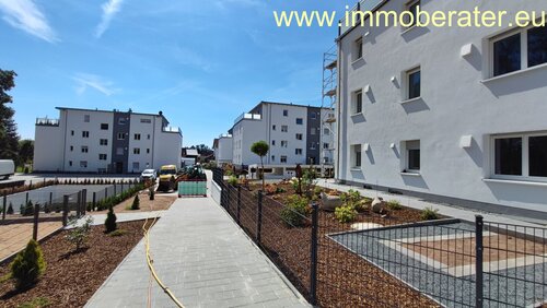 Foto - Besondere Möglichkeit: Große 4-Zi-Neubau-Whg WFL ca. 114 m² mit Terrasse und Gartenanteil Energiesparhaus ab 01.02.2026 zu vermieten.