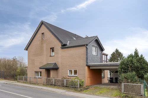 EG_Aussenansicht - 7 Zimmer Einfamilienhaus zum Kaufen in Leichlingen