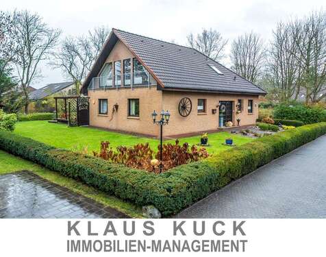 Titelbild - Provisionsfrei für Käufer: Attraktives Einfamilienhaus mit Einliegerwohnung, Wintergarten und Garage