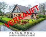 Titelbild - Provisionsfrei für Käufer: Attraktives Einfamilienhaus mit Einliegerwohnung, Wintergarten und Garage