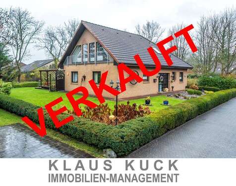 Titelbild - Provisionsfrei für Käufer: Attraktives Einfamilienhaus mit Einliegerwohnung, Wintergarten und Garage
