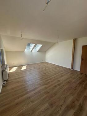 Wohnzimmer 2 - 3 Zimmer Mehrfamilienhaus, Wohnhaus in Loxstedt