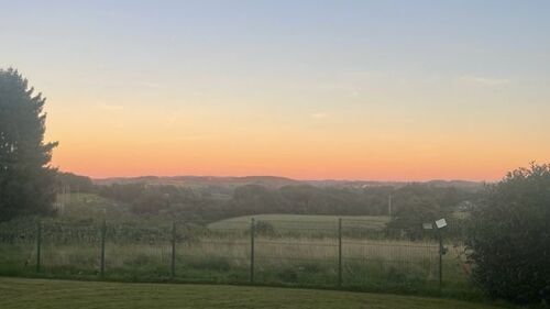 Fernblick vom Grundstück abends - Grundstück in Kürten