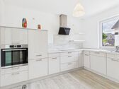 Küche_Bild_c2c66e5d - Außergewöhnliches Haus Wohnung über 2 Etagen in ruhiger Lage von Metjendorf-Oldenburg, KFW 70-ModernCarportGarten Wohnen am Rande von Oldenburg