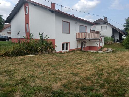 Rückseite 1 - Einfamilienhaus mit 140,00 m&sup2; in Heiligenroth zum Kaufen