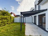 Terrasse mit Glasüberdachung - 4 Zimmer Doppelhaushälfte in Wiefelstede