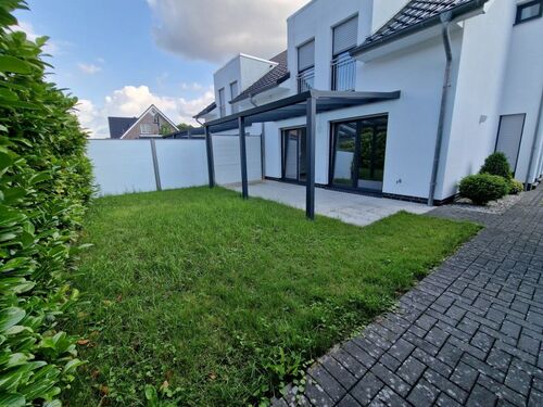 Gartenansicht - Doppelhaushälfte mit 126,66 m&sup2; in Wiefelstede zum Kaufen