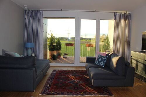 Wohnzimmer Ausblick - 3 Zimmer Einfamilienhaus zum Kaufen in Karlsfeld
