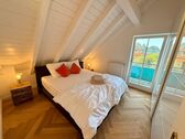 Schlafzimmer 1 - 3 Zimmer Dachgeschoßwohnung in Lindau/B