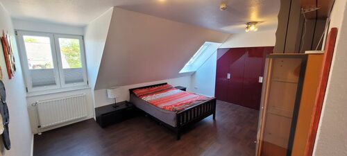 Schlafzimmer mit begehbarem Kleiderschrank - 