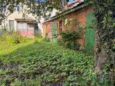 Hofansicht / Nebengebäude mit Gartenanteil - Doppelhaushälfte mit 145,00 m² in Perleberg zum Kaufen