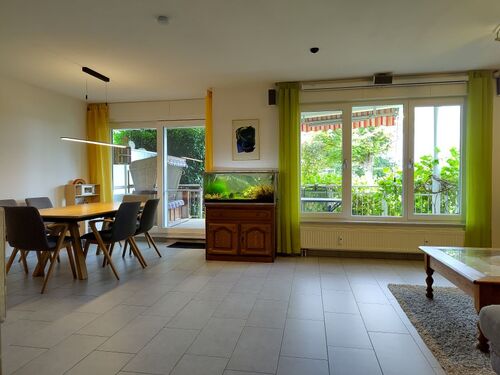 Wohn- und Esszimmer mit Gartenblick - 4.5 Zimmer Maisonettenwohnung zum Kaufen in Herne