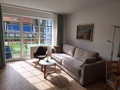 Wohnzimmer mit neuer Couch - 2- Zimmerwohnung mit 51,00 m&sup2; in Prerow zum Kaufen