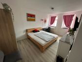 Schlafzimmer Detail mit Bett - 