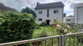 Vorderansicht - Provisionsfrei* von Privat: Mehrfamilienhaus mit großem Garten und zwei Garagen