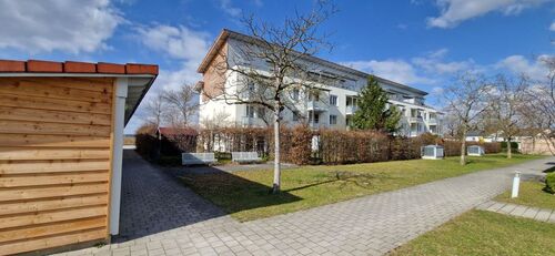 04 Hausansicht Süd-West - Etagenwohnung mit 95,00 m&sup2; in Kirchheim bei München zum Kaufen