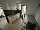 W8 Blick in die Wohnung mit Küche - 