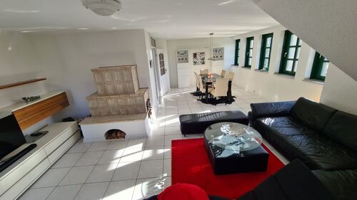 Kachelofen Ferienwohnung Wohnzimmer OG - 