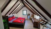 Schlafzimmer Ferienwohnung Spitzboden - 