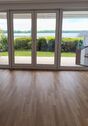 Wohnzimmer - 3- Zimmerwohnung mit 101,00 m&sup2; in Wedel zum Kaufen