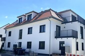 Außen_Haus - familienfreundliche moderne Erdgeschosswohnung mit Gartenanteil