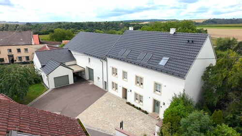 Luftbild - 10 Zimmer Mehrfamilienhaus, Wohnhaus zum Kaufen in Biesdorf