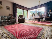 WG 1: Wohn- und Esszimmer mit Balkonblick - Zwei Wohnungen, ein Hausgefühl: „Haus-im-Haus-Charakter“ mit Garten, Sauna und Kaminzimmer