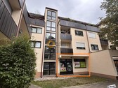 Gartenansicht - Preisreduzierung um EUR 30.000! Kapitalanlageimmobilie mit Tiefgaragenstellplatz in München