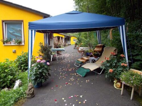 AnandaVillage-550x413 - Natur pur und behagliches Wohnen – 69 m² mit Kamin