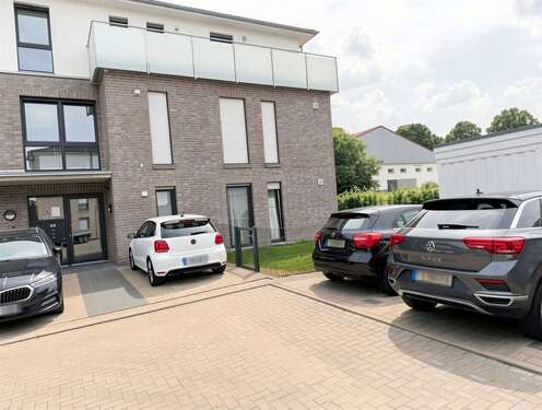 Stellplatz - (KI generiert) - Erdgeschoßwohnung mit 99,43 m&sup2; in Ostercappeln zum Kaufen