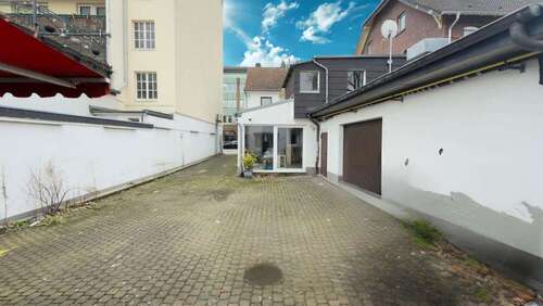 Hinterhof - Wohn- & Geschäftshaus mit 120,00 m&sup2; in Leverkusen zum Kaufen