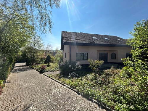 Hauseingangsseite - Einfamilienhaus mit 203,85 m&sup2; in Saulheim / Nieder-Saulheim zum Kaufen