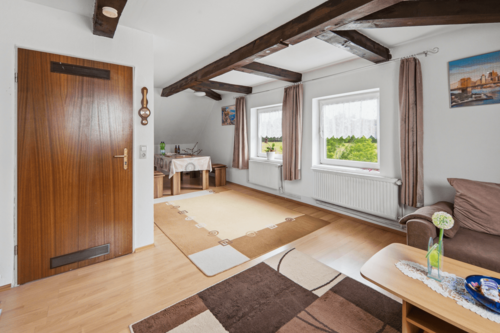 Wohnzimmer mit Blick auf die Oste - 