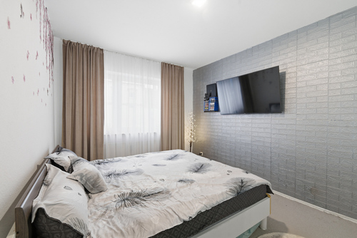 Gemütliches Schlafzimmer mit großen Fenstern - Erdgeschoßwohnung mit 54,46 m&sup2; in Neumünster zum Kaufen