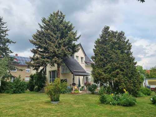 Gartenansicht - Vermietung Mansardenwohnung mit separater Gartennutzung