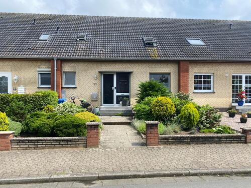 Hausansicht - Provisionsfrei: Gemütliches 4-Zimmer-Reihenhaus mit großem Südgarten in Hamminkeln-Mehrhoog