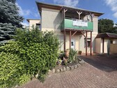Rückseite mit Balkon - Viel Raum für Ideen und Familienleben mit kleinem Gartenglück