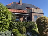 Blick vom Garten auf das Haus - Verbringen Sie diesen Sommer am Pool