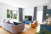 Wohnzimmer Couch grau Sessel orange - 